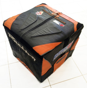 Custom made leather Ottoman using recycled leather racing suit