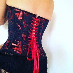 Burlesque satin brocade corset with fringing.