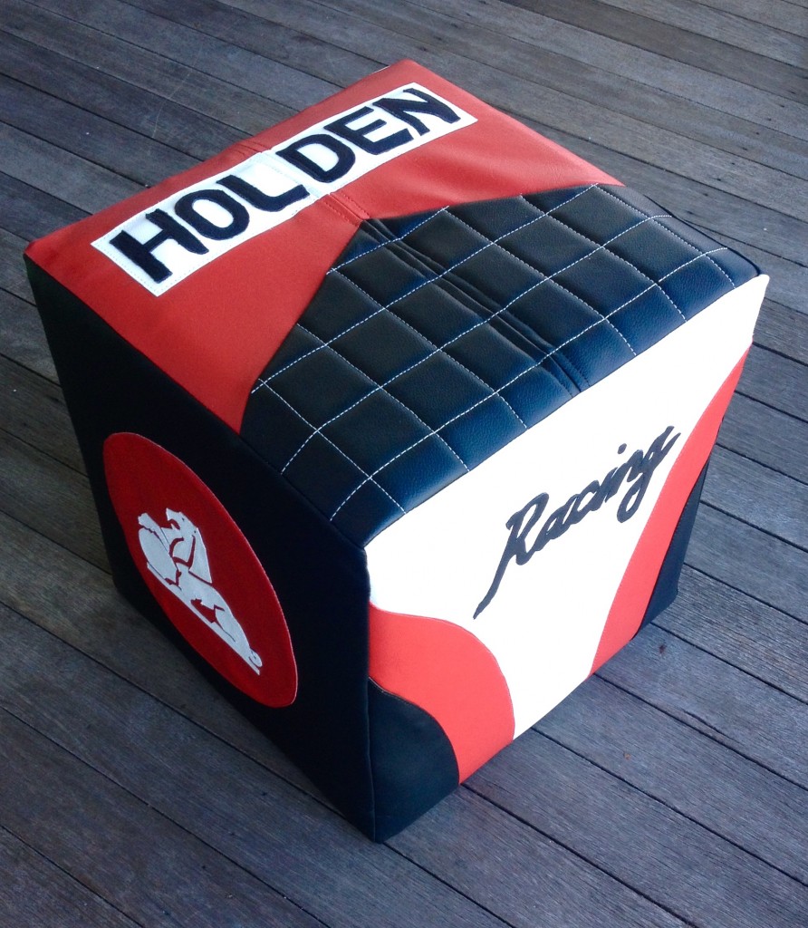 Custom Holden Foostool showing quilted top and Holden Logo.